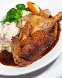 The Sandbar signature dishes Boneless Beef Short RibsSouthern Fried ChickenSteve’s Brown Butter Sole